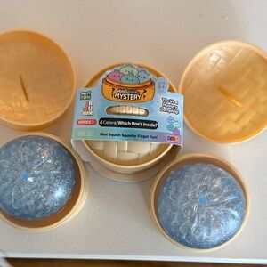 Mini Squishy Mystery Dumpling Fidget Toy - Light Blue Glitter